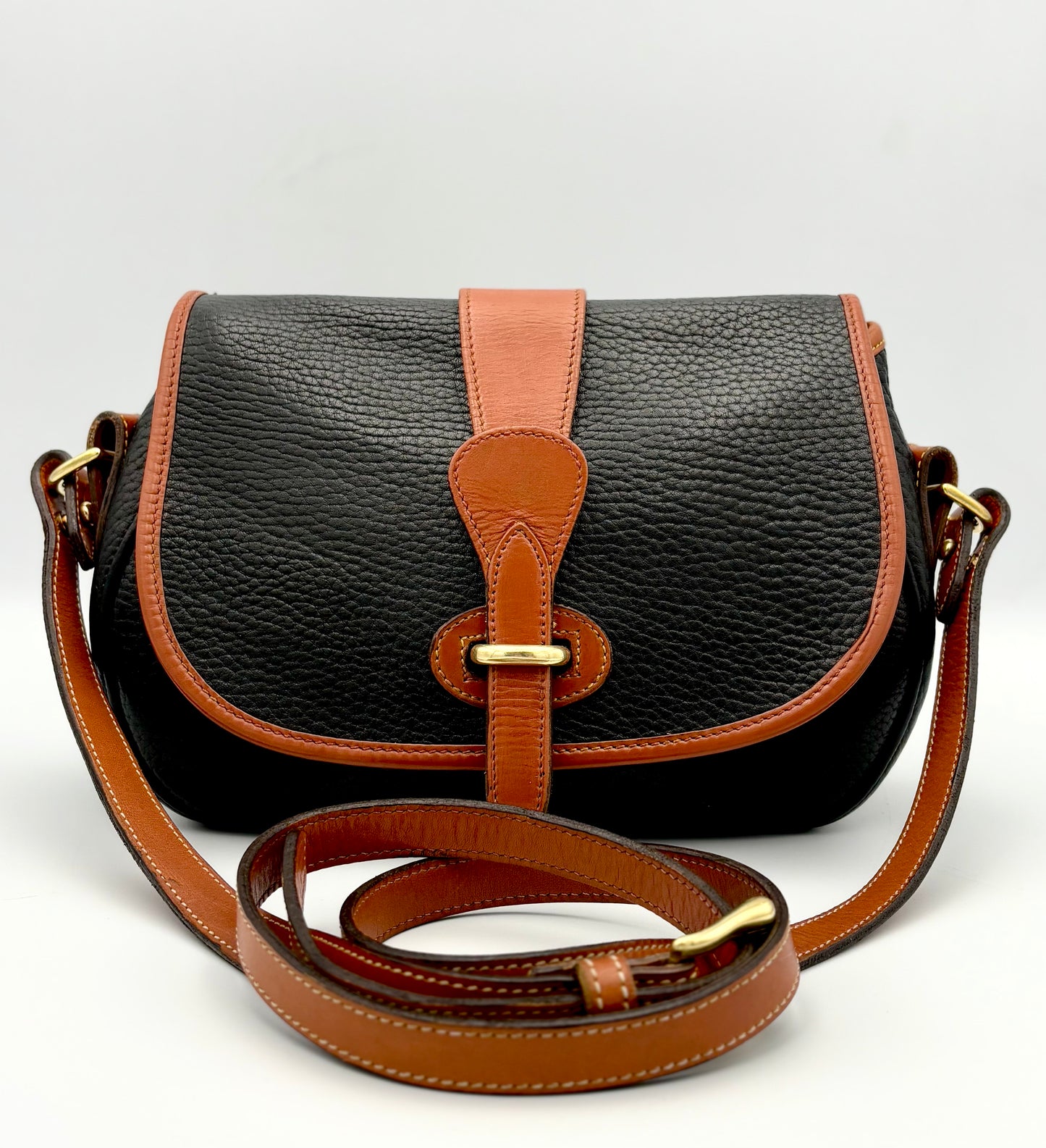 Authenticated Vintage Dooney & Bourke All Weather Leather Black/Tan Small Tack Saddlebag Crossbody